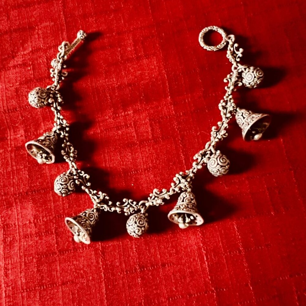 Sterling silver beaded bracelet with carved silver bells and carved silver balls